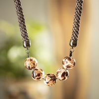 necklace ofri blacl & gold with five beads round shap