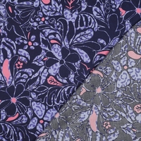 אריג כותנה סטן דפוס עלים טרופיים על רקע סגלגל