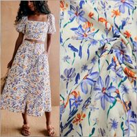 אריג כותנה דפוס גן פורח בסגול