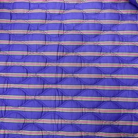 אריג קווילט דו צדדי דפוס מנדלות קטנות גווני ירוק סגול