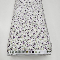 אריג כותנה פרחים קטנים בגווני סגול דגם שרון