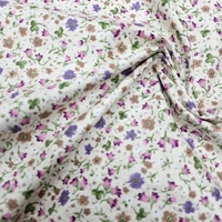 אריג כותנה דפוס פרחים קטנים על רקע שמנת דגם שני