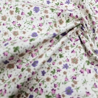 אריג כותנה דפוס פרחים קטנים על רקע שמנת דגם שני