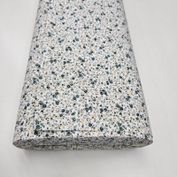 אריג כותנה פרחים קטנים בגווני ירוק דגם שרון