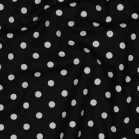 אריג כותנה נקודות לבן על רקע שחור