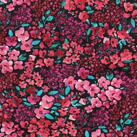 אריג כותנה דפוס פריחה מרהיבה על רקע שחור