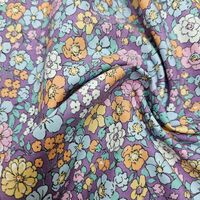 אריג כותנה אורגני דפוס פרחי שדה על רקע סגלגל