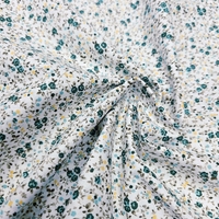 אריג כותנה פרחים קטנים בגווני ירוק דגם שרון