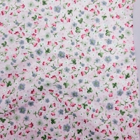 אריג כותנה דפוס פרחים קטנים על רקע ורוד דגם שני