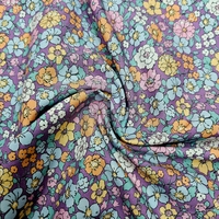 אריג כותנה אורגני דפוס פרחי שדה על רקע סגלגל