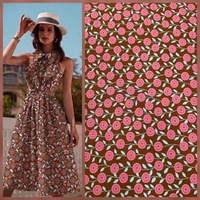 אריג כותנה דפוס פריחה כפרית בגוונים חמים