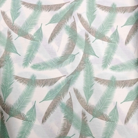 אריג כותנה דפוס נוצות בגווני מנטה אפור