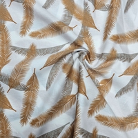 אריג כותנה דפוס נוצות בגווני כאמל אפור