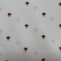 בוקלה טדי רקמת פטריות על רקע לבן חם