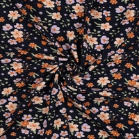 טריקו אורגני פרחים על רקע נייבי דגם שרון