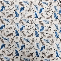 אריג כותנה דפוס עלעלים גווני כחול