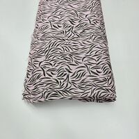 אריג ויסקוזה דפוס עלעלים מאורכים על רקע ורוד בלט