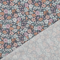 אריג כותנה אורגני דפוס פרחי שדה על רקע כחול מעושן