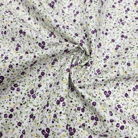 אריג כותנה פרחים קטנים בגווני סגול דגם שרון