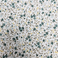 אריג כותנה פרחים קטנים בגווני ירוק דגם שרון