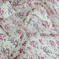 אריג שיפון פרחים קטנים בסגנון כפרי רקע אופוייט