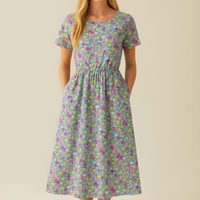 אריג כותנה דפוס פרחים שמחים על רקע טורקיז