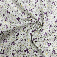 אריג כותנה פרחים קטנים בגווני סגול דגם שרון