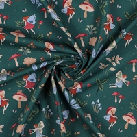 אריג כותנה דפוס פיות קסומות על רקע ירוק