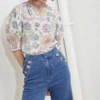 אריג כותנה דפוס בוהו על רקע לבן חם