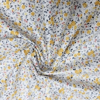 אריג כותנה פרחים קטנים בגווני צהוב דגם שרון