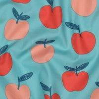 אריג כותנה דפוס פירות על רקע פטרול בהיר