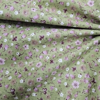 אריג כותנה דפוס פרחי פעמונית קטנים על רקע פיסטוק