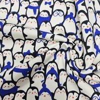 בד פוטר דפוס פינגווינים גווני כחול רויאל ולבן