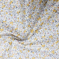 אריג כותנה פרחים קטנים בגווני צהוב דגם שרון