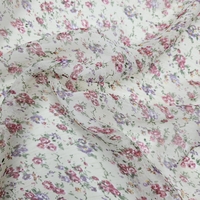 אריג שיפון פרחים קטנים בסגנון כפרי רקע אופוייט