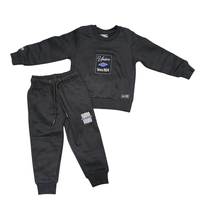 חליפה פוטר מדוגמת UMBRO בנים 2-8 (שחור/אופוויט)