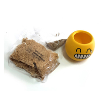 ראש דשא חייכן - בכלי קרמיקה