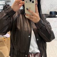 מעיל עור משומן כיווצים