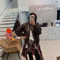 מעיל עור משומן כיווצים