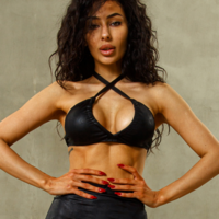 Set EASY DESEAR black leather top + skirt (with sewn-in shorts)