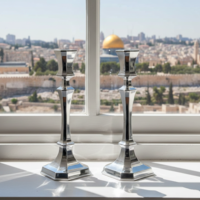 Candlesticks for Shabbat in a clean and magnificent design made of pure 925 silver, handmade on a Jerusalem window sill