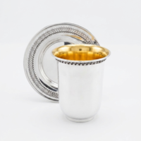 An elegant, handmade Kiddush set with filigree decoration made of pure silver, made in Israel.