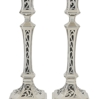 Candlesticks with a luxurious design and unique hand-sawing from pure silver