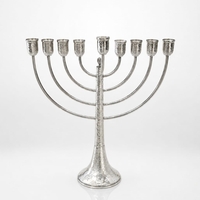 Traditional hammered Chanukah menorah made of pure 925 silver