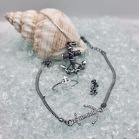 Silver anchor bracelet with zircons