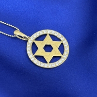 Star of David 14k yellow gold pendant with zircons inlay around