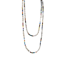 A long string of wild white pearls combined with colorful Swarovski stones