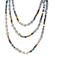 A long string of wild white pearls combined with colorful Swarovski stones