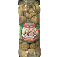 שימורי פטריות שמפיניון שלמים מוחמצים