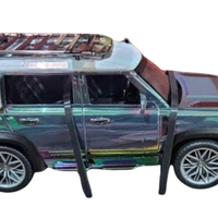 מכונית ברזל על שלט  בעיצוב Land Rover Defender